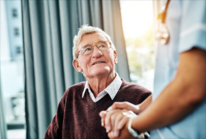 Photo of a cancer patient speaking with a doctor