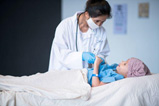 Doctor examining child patient