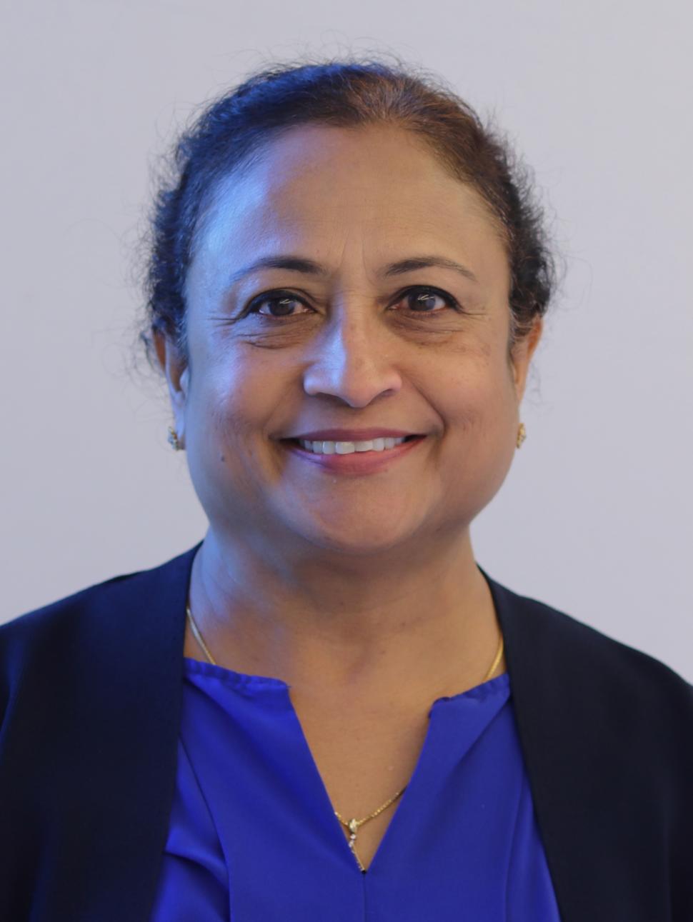 Headshot of Dr. Moly J. Aryankalayil, Ph.D.