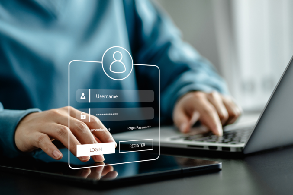 A user enters log-in information on a laptop.