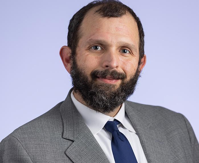 Headshot of Heath Skinner, M.D., Ph.D.