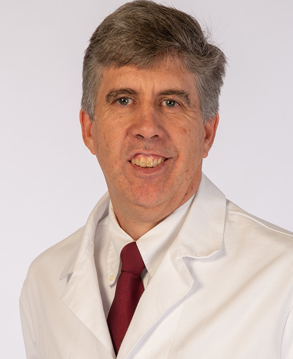 photo of Dr. Hawkins in a white lab coat
