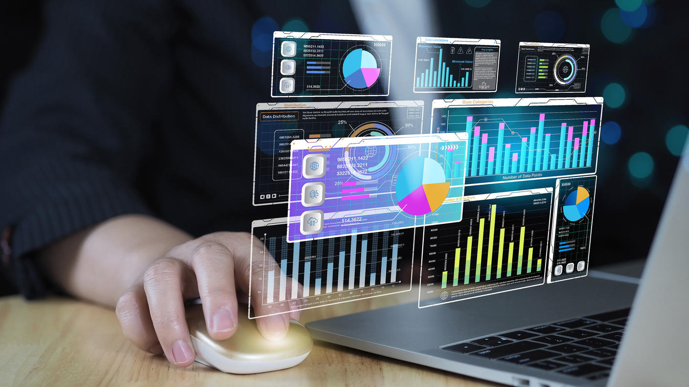 Data scientist using laptop computer and software to analyze data