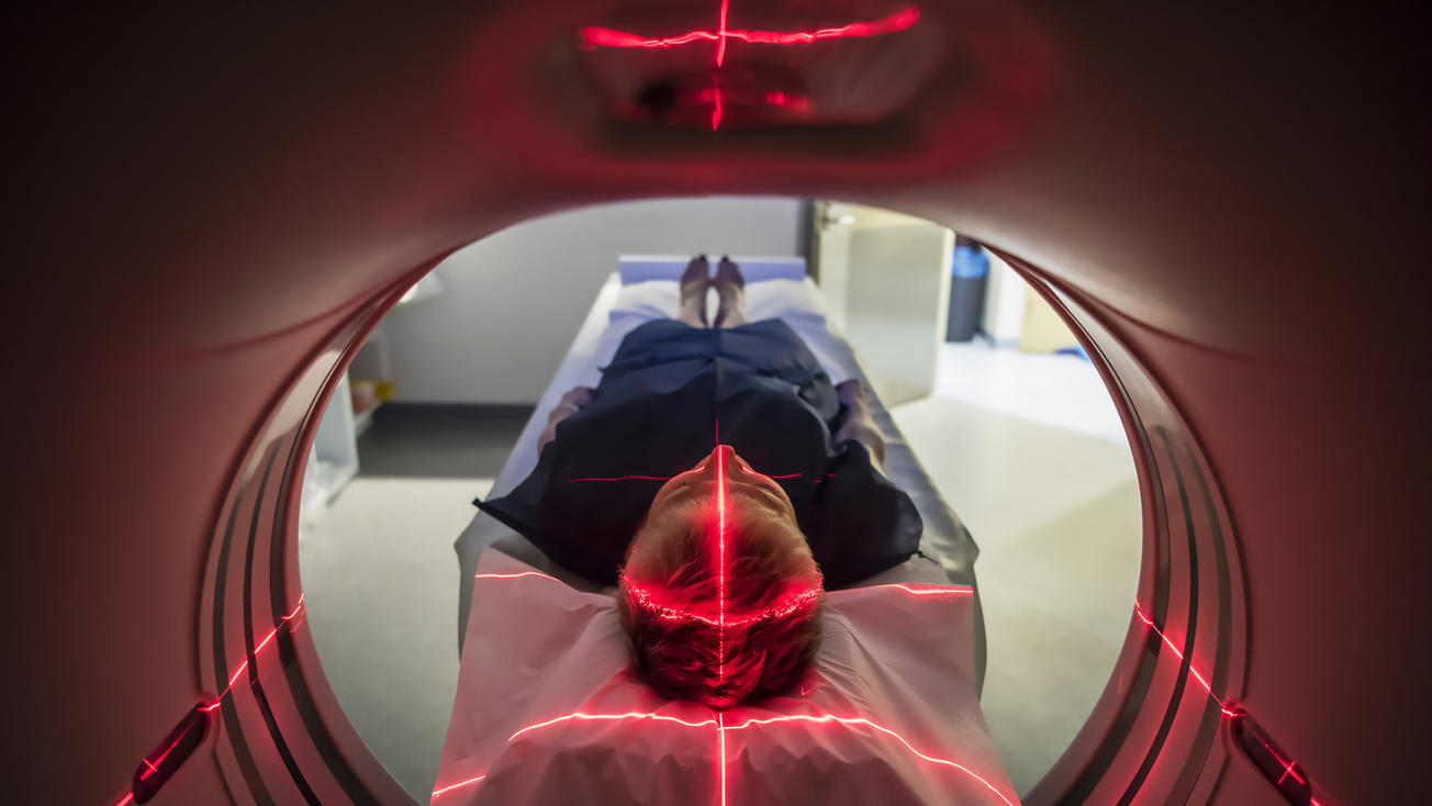 Patient undergoing a PET scan for imaging 