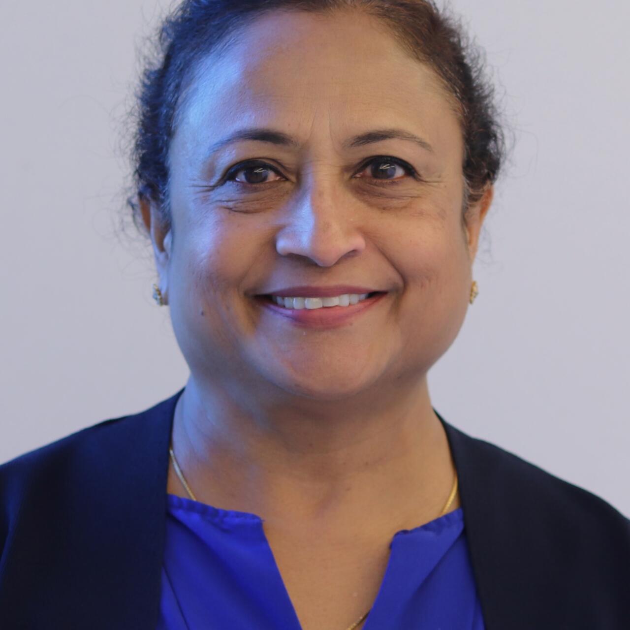 Headshot of Dr. Moly J. Aryankalayil, Ph.D.