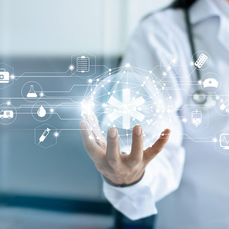 Doctor and medical network connection with modern virtual screen interface in hand on hospital background